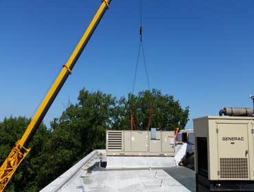 Newbury college Chiller Replacement Remove existing roof top chiller and replace with new 130 ton chiller