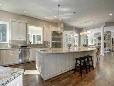 GULICK | CUSTOM Home in McLean The impressive stone and HardiePlank® elevation on our Winthrop really stood out on this corner lot of approximately one