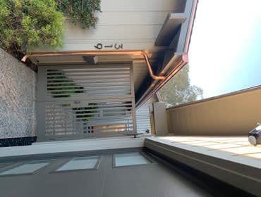Photos by Superior Metal Gutters #1 Copper 5" ogee gutter 3" round downspouts