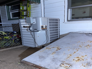 Photos by Golden Dragon Management & Services Inc #1 Replacement of old forced air oil burner with heat pump system. Chimney will be capped of, and ret