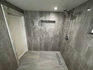 Photos by Iq Tile LLC #1 Full curb less shower