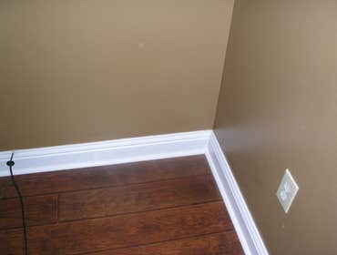Crown molding, painting, and flooring Installed crown molding in guest room. Installed laminate flooring in guest room. Painted the guest room.
