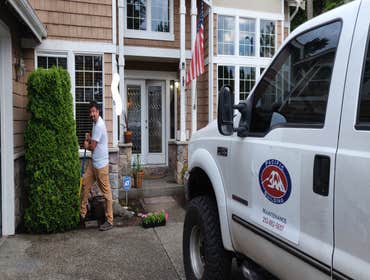 Photos by Pacific Bldg Maintenance LLC #4 Transplanting evergreen bush to allow more sunlight in the front office space of home.