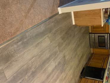 Photos by Alaska's Supreme Painting #1 Flooring install, painting, and bathroom remodel