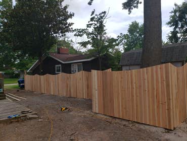 Photos by Everett's Construction Inc #1 A sun rise design with cedar materials