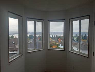 Photos by Timber Mount LLC #7 Full window replacement and bay-frame renovation, including demolition of old units, reframing, insulation, installation 