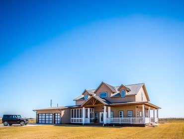 Ranch Road Ranch Road is a design that originated on an open rural site. Located west of Calumet, Oklahoma the site is situated next to a lake with a s