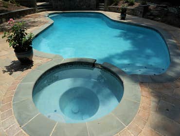 Photos from Crystal Blue Aquatics Llc New Construction of pool with full automation, LED lighting, high end travertine patio decking, beautiful water f