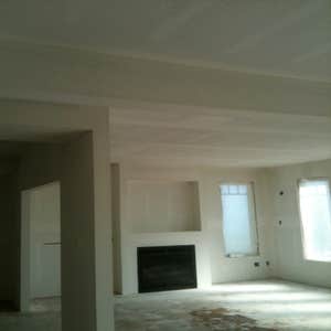 new construction home was a custom two story home about 2,400 square ft. with an orange peel texture. job turned out really nice. All the corner...