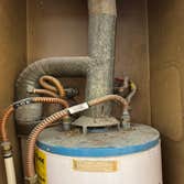 Water Heater Replacement/Vent Replacement Replacement of water heater, supply lines and vent through roof. Floor was damaged due to leak and was replac