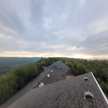 Roof Replacement Tearing off old 3-Tab shingles, and replacing with a standing seam metal roofing system on a large project up the North Shore!