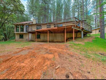Deck project by Good Life Construction Replaced an old weathered down wooden deck with a new weather resistant composite deck.