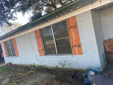 Photos by Handy Express #1 Replace siding on the side of a 2 story home