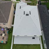 Photos by WOODSTONE ROOFING