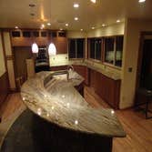 Kitchen Remodel 1 Take a look at the fabrication of this beautiful granite. Heat coils were installed under the bar to keep it comfortably warm.