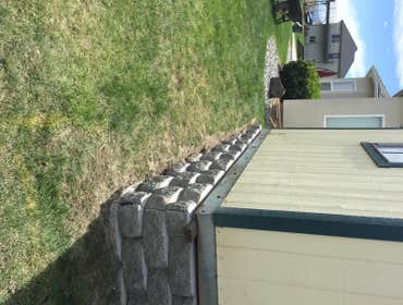 3603 Verbena Ct Dig a foundation, to have landscape cement blocks installed to have a shop set on foundation.
