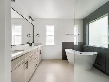 Daniel | Bathroom This modern bathroom remodel in Kenmore, WA, was designed to balance contemporary elegance with daily functionality. The clients want