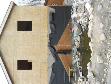 Photos by Innovative Masonry Restoration and Concrete #1 New stone work and cedar planking with pond