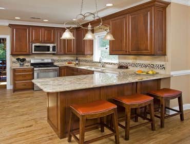 Kitchen Cabinet Refacing View our project portfolio to see our high-quality kitchen cabinet refacing restorations.