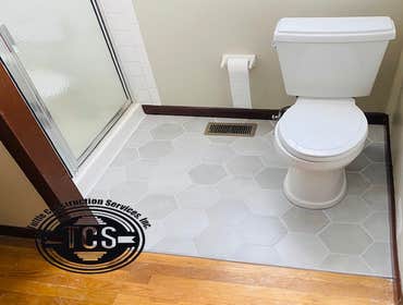 Photos by Tuttle Construction Services Inc #8 Bathroom remodel with hexagon tile floor.