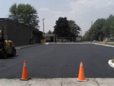 Photos by Quality Paving and Concrete LLC #1 New asphalt private road and parking lot