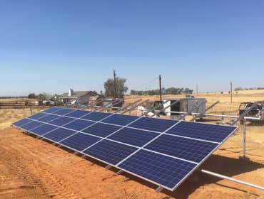 Yuba County Ground Mount Y Grene funded 11.2KW DC grid tied ground mounted solar system. Canadian Solar modules paired with Solar Edge Optimizers and a