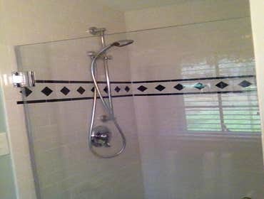 Retro Bathroom We took another 1950's, small, master bathroom and updated it. I have attached before and after photos.