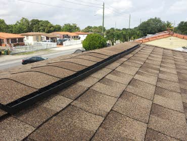 Shingle and Flat Roof Miami Roof was completed using GAF HD Shingles on the pitch roof and GAF Modified felts on the flat roof