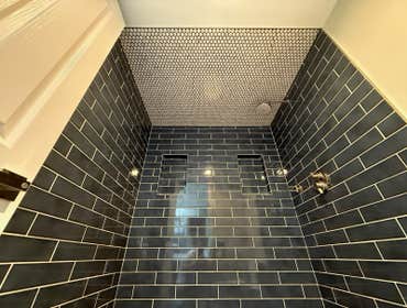 Photos by Purflo plumbing LLC #1 Custom 3’x5 subway tiled shower with mitered joints