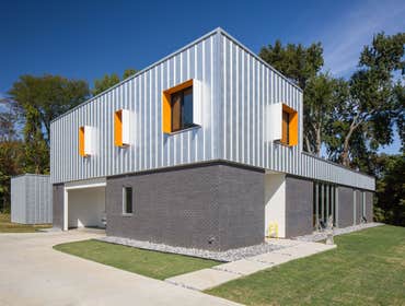 House For 5 A family with three children recently moved to a small, rural, west Tennessee town where they sought a house more suited for their contempo