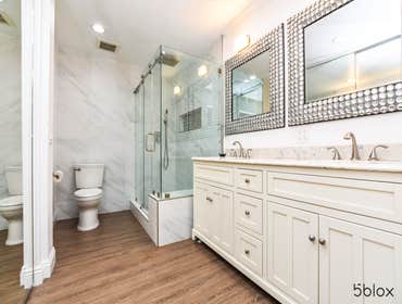 Bathroom Remodel In Huntington Beach, CA We completed a two bathroom remodel in Huntington Beach, CA. We retiled the floors, the shower and a stand-in 