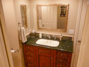 2007: Bath and Home Office for Two With a View This home was built with a very small office or potential maid’s quarters located next to the garage and