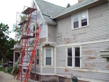 New Creation Painting Project Exterior painting of historic home near Astor Park in Green Bay, WI