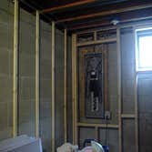 Project 1, building a basement with a powder room, Project 2, restoration of ceder shingles & shutters Framing over concrete, installing electric ligh