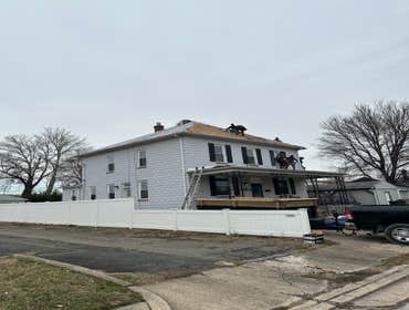 Photos by Flores Home Improvement LLC #1 Roof replacement paint wainscoting installation frame and drywall installation