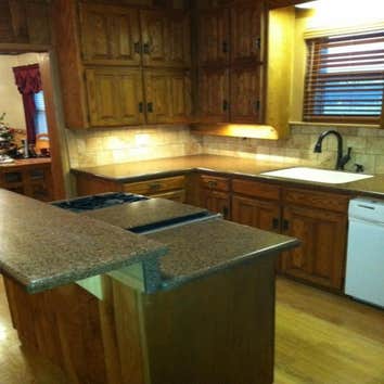 Bookout kitchen project Solid Surface countertops with undermount sink and tile splash.