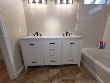 Photos by Colorado Plumbing Services, Corp #3 New sinks, faucets, tub and shower, plus a high efficiency tankless water heater.