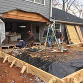 In sandy planes ga a new retaining wall and a sun room addition