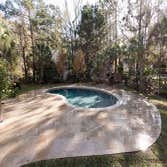 Travertine Pool Deck with custom design Oudoor Fireplace This pool deck and fireplace was a custom design for our client in Charleston, South Carolina.