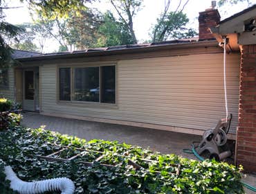 Exterior Renovation • Remove all skylights from roof
• Frame up existing openings
• Install new plywood, ice shield and shingles
• Remove four windows
