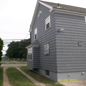 Brilliant Painting, LLC Exterior Project 1 Before and after photos of a full house that has been power washed, scraped, hand sanded, primed, and...