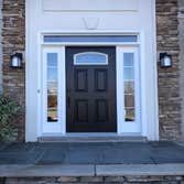 Main entry door with 2 sidelights Existing door frame rotted away due to water damage, remove the old door and two sidelights and install new entry doo