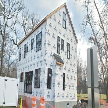 Photos by Alfredos Construction LLC #1 We did a complete rebuild on this property from floor bathrooms,kitchen,siding,HVAC et
