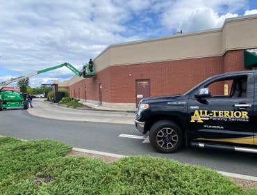 Painting the exterior Starbucks and Minimall We prepared this Starbucks as well as the entire building for painting by first power washing it clean. T