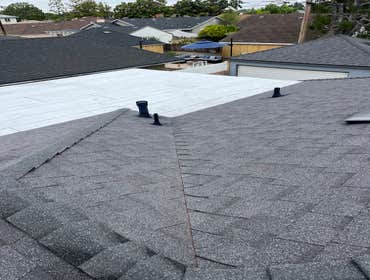 Photos by 701 Roofing Inc #1 Tear off
Repair damaged wood
New cool roof shingles
New polyfresko cool roof