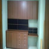 Commercial millwork custom reception desks, custom PLAM cabinets & desktops, custom closets/shelving