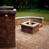 Hardscape Patio The patio renovation consisted of adding sitting walls, columns, a fire pit and a lower patio area to an existing patio.