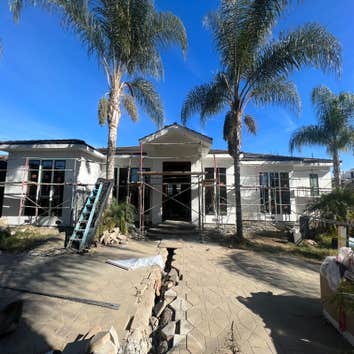 Photos by Precise Building & Restoration Inc #1 This is a New Construction with 14ft High ceilings all across the home, this home was designed & crafte