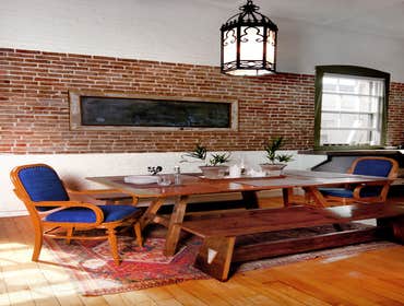 Historic West End condo remodel Complete remodel all finish materials used were reclaimed salvage lumber. Deck is made of aluminum decking with a stain