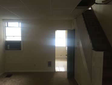 view into kitchen from living